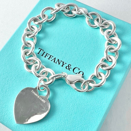 Tiffany please return - co., to