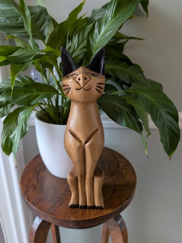 Hand carved wooden cat - hand,