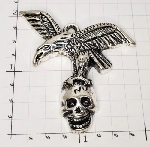 Eagle carrying skull pendant - carrying,
