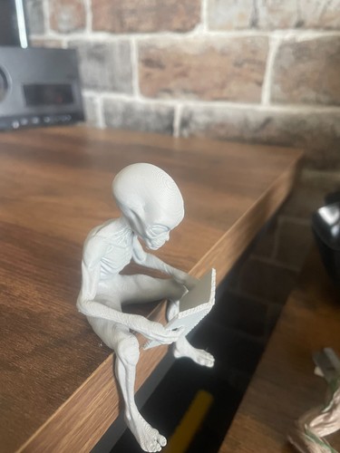 Grey alien figure - grey,