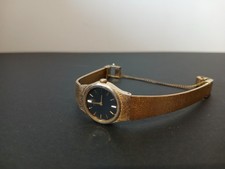 Vintage Seiko Round Gold Black