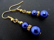 A PAIR OF COBALT BLUE GLASS