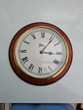 Vintage Round Abbey Wall Clock With Roman Numeral Hour Indicators