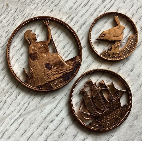 Carved out coins penny half - out,