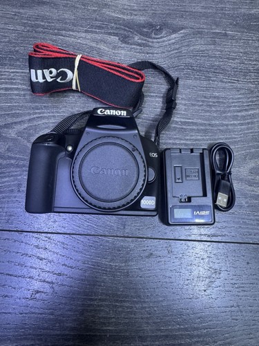 Canon eos 1000d mp - canon,