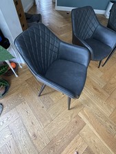 A pair of 2 (Nearly New) Ergonomic Faux Dinning chair with Armrest Grey Colour
