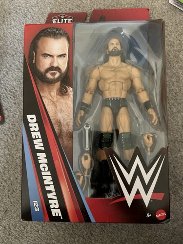 Wwe action figure elite - action,