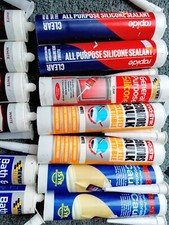 Bundle of clear & white sealants and decorating caulk + Caulking Gun