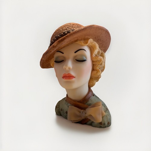 Cameo girls head - eve, 1935