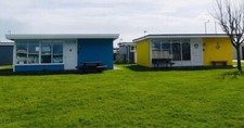 THE BEACH HUTS CAMBER SANDS HOLIDAY LET. EAST SUSSEX . SLEEPS 6 CHALETS FOR SALE