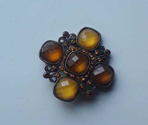 Brooch brown stones - –,