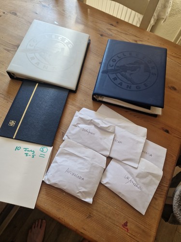 Stamp albums with stamps pile - stamp,