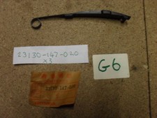 NOS HONDA NC50 1978-83 DRIVE CHAIN TENSIONER 23130-147-020 (G6)