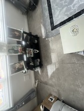 Argos oval black glass 3 tier tv stand.  Excellent condition