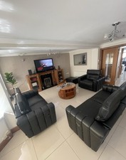 Black 3-2-1 electrical recliner sofa set with footstool, manual 2-seater.