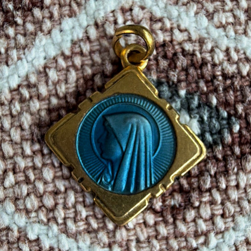 Gold plated virgin mary
