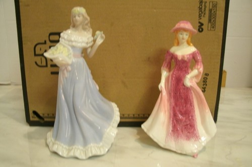 Ladies figurines one is - x,
