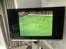 Bang & Olufsen tv With  Remote And Motorised Stand