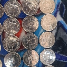 makers of the millennium coin