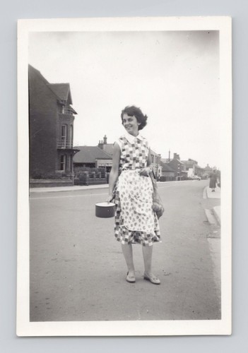 Old photo woman in street - photo,