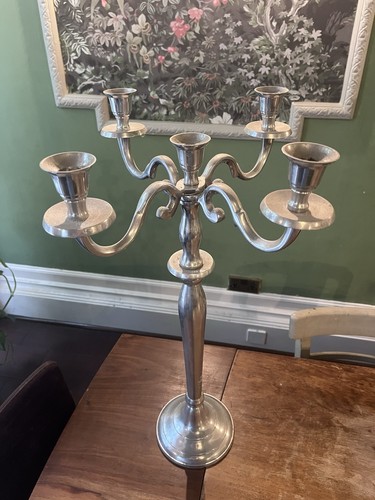 Tall silver four - four, arm
