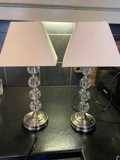 Pair tall silver and faux