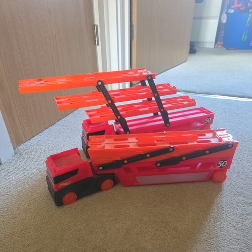 Two hot wheels mega - hot, hauler
