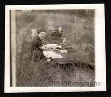 WOMAN BLANKET TALL GRASS