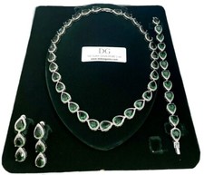 White gold finish Emerald and