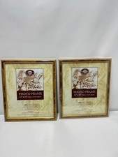 Wilko photo frame with a gold-tone, wood-effect finish, measuring 12" x 10"