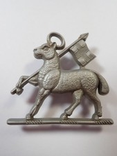 Queens (West Surrey) Regiment original WW2 Economy Plastic Cap Badge.