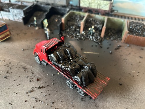Coal yard huts trucks - coal, huts,