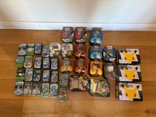 Pokemon Tins Bundle x38 all  empty and contain no cards celebrations + charizard