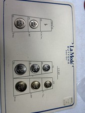 La Mode Buttons lot of 8 goldtone miltary type mix 1/2 to 3/4 in on card Vintage