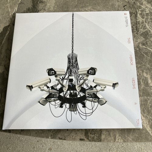 Interpol this mirror weighs - interpol, a