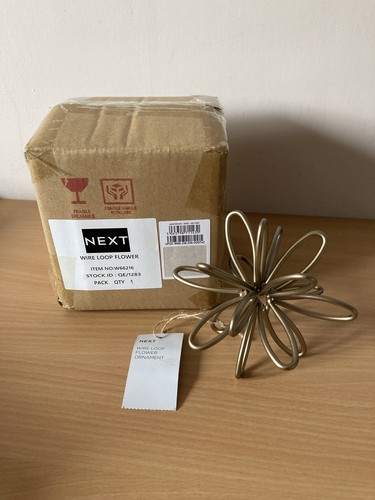 Next metal wire - next, flower