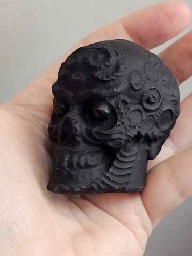 Carved black obsidian skull - obsidian,