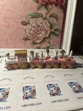 Pink and White Wooden Train