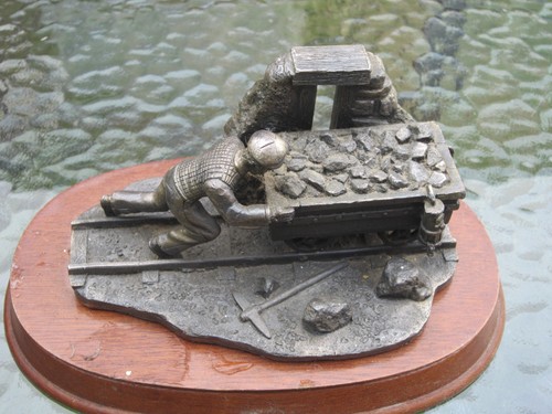 Vintage pewter miner pushing - vintage,
