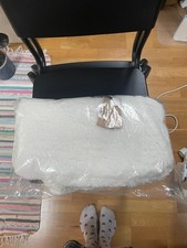 Long hot water bottle with hand pockets, from futon company, Fluffy white teddy 