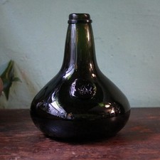 Hand-Blown Black Glass Onion Bottle With Applied Seal – 19 cm