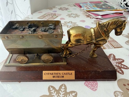 Vintage brass horse and coal