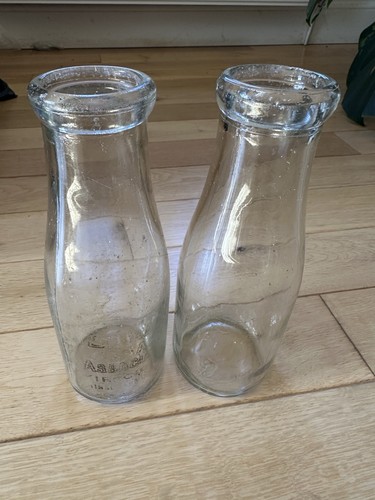 Pair vintage milk bottles - of,