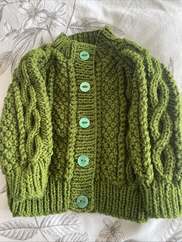 Hand knitted baby girl olive - hand,