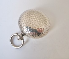 Hand hammered silver sovereign