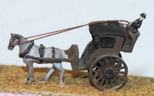 Horse drawn cart hansom - cart,