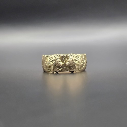 Solid 18ct gold two - 18ct, lions