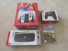 Nintendo Switch OLED Bundle with Pro Controller and Carry Case + Minecraft Game.