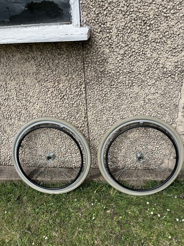 Pair wheelchair rear wheels - of,
