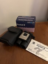 Minolta Pocket 11  8x22